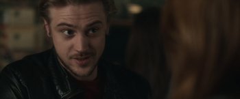 Movie still from “The Skeleton Twins” (2014), directed by Craig Johnson – A person wearing a leather jacket; Close Up shot, Over the shoulder angle