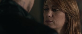 Movie still from “The Skeleton Twins” (2014), directed by Craig Johnson – A person looking at the camera; Close Up shot, Over the shoulder angle