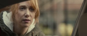 Movie still from “The Skeleton Twins” (2014), directed by Craig Johnson – A person wearing a jacket; Close Up shot, Over the shoulder angle