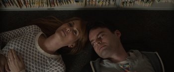 Movie still from “The Skeleton Twins” (2014), directed by Craig Johnson – A man and a woman laying on the ground; Close Up shot, Overhead angle
