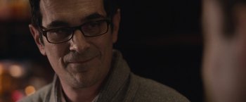 Movie still from “The Skeleton Twins” (2014), directed by Craig Johnson – A person wearing glasses; Close Up shot, Over the shoulder angle