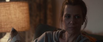 Movie still from “The Skeleton Twins” (2014), directed by Craig Johnson – A person sitting on a couch; Close Up shot, Over the shoulder angle