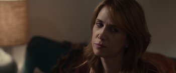 Movie still from “The Skeleton Twins” (2014), directed by Craig Johnson – A person with long red hair; Close Up shot, Over the shoulder angle