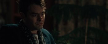 Movie still from “The Skeleton Twins” (2014), directed by Craig Johnson – A person wearing a jacket and a neck tie; Close Up shot, Over the shoulder angle