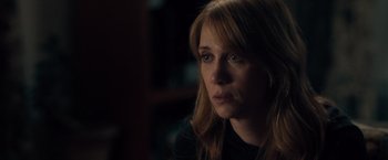 Movie still from “The Skeleton Twins” (2014), directed by Craig Johnson – A person with long red hair; Close Up shot, Over the shoulder angle