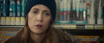 Movie still from “The Skeleton Twins” (2014), directed by Craig Johnson – A person wearing a hat; Close Up shot, Over the shoulder angle