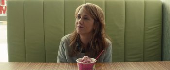 Movie still from “The Skeleton Twins” (2014), directed by Craig Johnson – A woman sitting in front of a bowl of ice cream; Close Up shot, Over the shoulder angle
