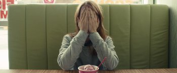 Movie still from “The Skeleton Twins” (2014), directed by Craig Johnson – A woman sitting in front of a bowl of ice cream; Close Up shot, High angle