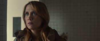 Movie still from “The Skeleton Twins” (2014), directed by Craig Johnson – A person with long red hair; Close Up shot, Over the shoulder angle