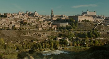 Movie still from “The Skin I Live In” (2011), directed by Pedro Almodóvar – A view of a city from a hill; Extreme Wide shot, High angle