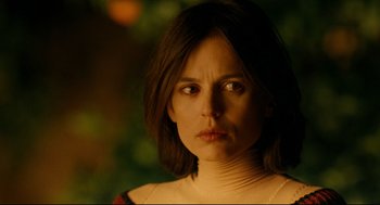 Movie still from “The Skin I Live In” (2011), directed by Pedro Almodóvar – A person wearing a necklace; Close Up shot, Low angle