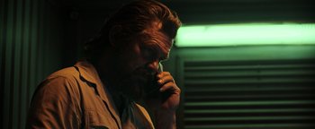 Movie still from “Sicario: Day of the Soldado” (2018), directed by Stefano Sollima – A person talking on a cell phone; Close Up shot, Low angle