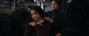 Movie still from “Sicario: Day of the Soldado” (2018), directed by Stefano Sollima – A young girl getting her hair combed by an adult; Close Up shot, Over the shoulder angle