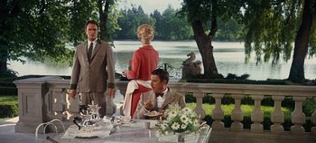 Movie still from “The Sound of Music” (1965), directed by Robert Wise – A man and a woman sitting at a dinner table; Wide shot, Over the shoulder angle