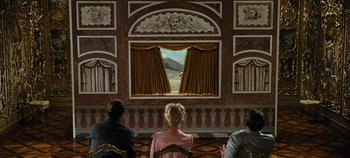 Movie still from “The Sound of Music” (1965), directed by Robert Wise – Three people sitting in front of an open window; Wide shot, Over the shoulder angle