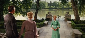 Movie still from “The Sound of Music” (1965), directed by Robert Wise – Two women are standing in front of a lake; Wide shot, Over the shoulder angle