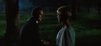 Movie still from “The Sound of Music” (1965), directed by Robert Wise – A man and a woman talking to each other in the dark; Close Up shot, Over the shoulder angle