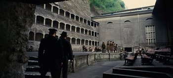 Movie still from “The Sound of Music” (1965), directed by Robert Wise – A group of people standing in front of a building; Extreme Wide shot, High angle
