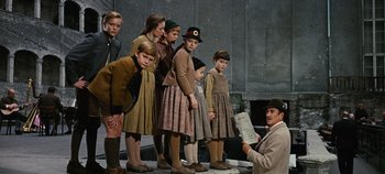 Movie still from “The Sound of Music” (1965), directed by Robert Wise – A group of young people standing next to each other; Medium shot, Low angle
