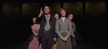 Movie still from “The Sound of Music” (1965), directed by Robert Wise – A group of people standing in front of each other; Medium shot, Low angle