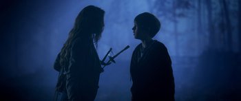 Movie still from “The Spiderwick Chronicles” (2008), directed by Mark Waters – Two young people are holding their musical instruments; Medium shot, Over the shoulder angle