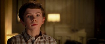 Movie still from “The Spiderwick Chronicles” (2008), directed by Mark Waters – A young boy is looking into the camera; Close Up shot, Over the shoulder angle