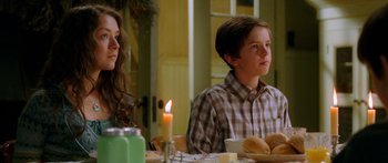 Movie still from “The Spiderwick Chronicles” (2008), directed by Mark Waters – A boy and a girl sitting at a dinner table; Close Up shot, Over the shoulder angle