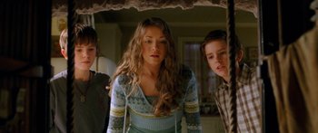 Movie still from “The Spiderwick Chronicles” (2008), directed by Mark Waters – A group of young people standing next to each other; Medium shot, Low angle