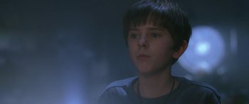 Movie still from “The Spiderwick Chronicles” (2008), directed by Mark Waters – A young boy is looking into the distance; Close Up shot, Low angle