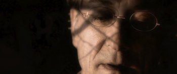 Movie still from “The Spiderwick Chronicles” (2008), directed by Mark Waters – A person's face wearing glasses; Extreme Close Up shot, High angle