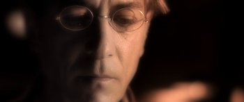 Movie still from “The Spiderwick Chronicles” (2008), directed by Mark Waters – A person wearing glasses; Extreme Close Up shot, High angle