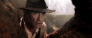 Movie still from “The Spiderwick Chronicles” (2008), directed by Mark Waters – An older man wearing a hat looking at the camera; Close Up shot, Over the shoulder angle