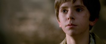 Movie still from “The Spiderwick Chronicles” (2008), directed by Mark Waters – A young boy's face; Close Up shot, Low angle