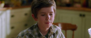 Movie still from “The Spiderwick Chronicles” (2008), directed by Mark Waters – A young boy is looking at the camera; Close Up shot, Over the shoulder angle