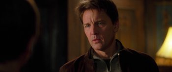 Movie still from “The Spiderwick Chronicles” (2008), directed by Mark Waters – A person wearing a brown jacket; Close Up shot, Over the shoulder angle