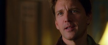 Movie still from “The Spiderwick Chronicles” (2008), directed by Mark Waters – A man's face in a dark room; Close Up shot, Over the shoulder angle