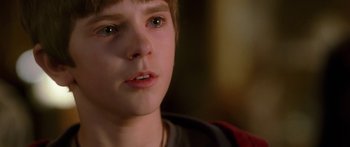 Movie still from “The Spiderwick Chronicles” (2008), directed by Mark Waters – A young boy's face; Close Up shot, Over the shoulder angle