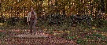 Movie still from “The Spiderwick Chronicles” (2008), directed by Mark Waters – A man standing in the middle of a forest; Wide shot, Over the shoulder angle