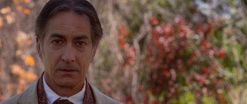 Movie still from “The Spiderwick Chronicles” (2008), directed by Mark Waters – A person wearing a suit and tie; Close Up shot, Over the shoulder angle