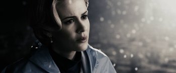 Movie still from “The Spirit” (2008), directed by Frank Miller – A person with short blonde hair; Close Up shot, Low angle