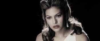 Movie still from “The Spirit” (2008), directed by Frank Miller – A black and white photo of a woman with long earrings; Close Up shot, Low angle