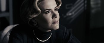 Movie still from “The Spirit” (2008), directed by Frank Miller – A person wearing a black shirt; Close Up shot, Low angle