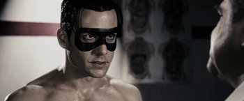 Movie still from “The Spirit” (2008), directed by Frank Miller – A person wearing a mask; Close Up shot, Low angle