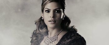 Movie still from “The Spirit” (2008), directed by Frank Miller – A woman wearing a diamond necklace and a black dress; Close Up shot, Low angle