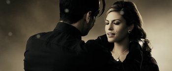 Movie still from “The Spirit” (2008), directed by Frank Miller – A man and a woman are looking at one another; Close Up shot, Over the shoulder angle