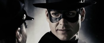 Movie still from “The Spirit” (2008), directed by Frank Miller – A person wearing a mask; Close Up shot, Low angle