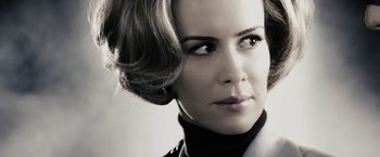 Movie still from “The Spirit” (2008), directed by Frank Miller – A person wearing a jacket; Close Up shot, Low angle