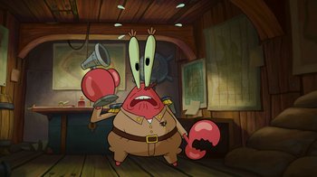 Movie still from “The SpongeBob Movie: Sponge Out of Water” (2015), directed by Mike Mitchell – A cartoon character is holding a balloon and a microphone; Medium shot, High angle