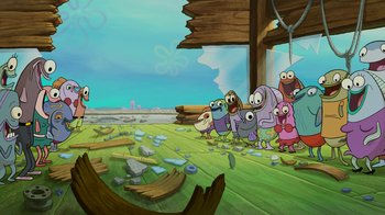 Movie still from “The SpongeBob Movie: Sponge Out of Water” (2015), directed by Mike Mitchell – A group of people standing in front of a pile of rubble; Extreme Wide shot, High angle