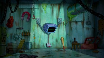 Movie still from “The SpongeBob Movie: Sponge Out of Water” (2015), directed by Mike Mitchell – A computer monitor sitting on top of a floor; Extreme Wide shot, High angle